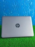 Closed HP 725 G4 laptop with HP logo on the lid