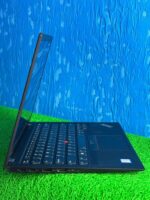 Lenovo X1 Carbon Showing its Top Surface and Logo, Highlighting its Sleek Design.